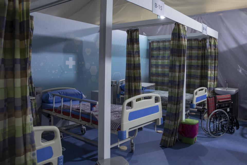 Hospital beds are prepared to receive COVID-19 patients at Ain Shams University Field Hospital in Cairo, Egypt, Wednesday, June 17, 2020. The hospital has a capacity of 179 beds including 11 Intensive Care Units, Dr. Ashraf Omar, dean of the medical school said Wednesday in televised comments. (AP Photo/Nariman El-Mofty)