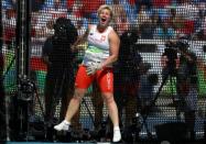 2016 Rio Olympics - Athletics - Final - Women's Hammer Throw Final - Olympic Stadium - Rio de Janeiro, Brazil - 15/08/2016. Anita Wlodarczyk (POL) of Poland reacts after setting a new world record. REUTERS/Phil Noble