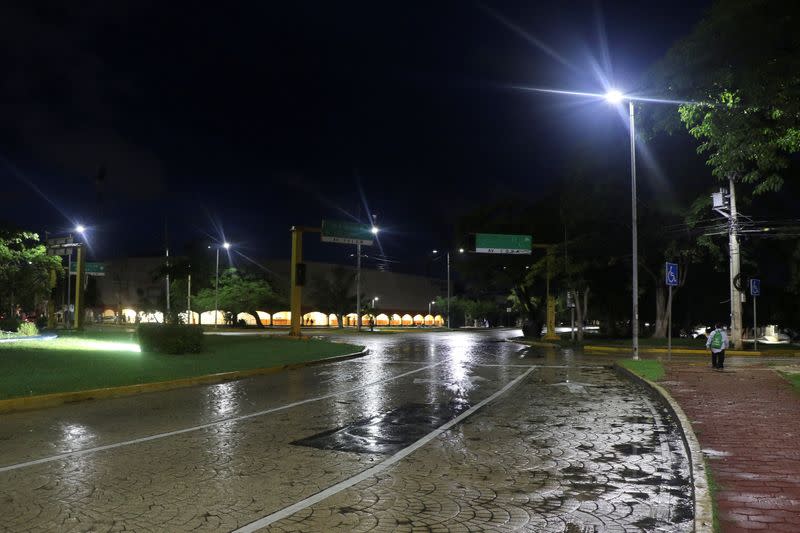 An empty avenue is pictured as Hurricane Delta approaches Cancun