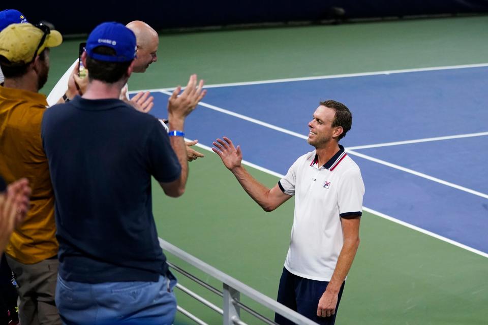 Thousand Oaks High graduate Sam Querrey is greeted by fans after his first-round loss to Ilya Ivashka at the U.S. Open on Tuesday. Querrey, 34, has announced his retirement from professional tennis.