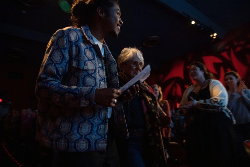 Rep. Justin Jones D-Nashville, and Joan Baez walk towards the front of the theater following the debut of her new documentary “I Am a Noise” at Belcourt Theater in Nashville , Tenn., Saturday, Oct. 21, 2023.