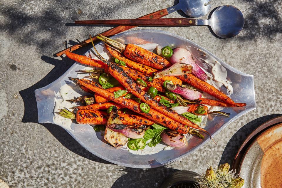 Spicy cumin-serrano yogurt is the perfect base for grilled carrots.