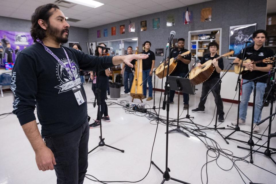Mike Hernadez, mariachi teacher at Franklin High School, instructs his students at rehearsal on Friday, Feb. 9, 2024. Mariachi Estrella Del Oeste is one of the four El Paso Independent School District high schools that have secured spots in the 2024 UIL State Mariachi Festival.
