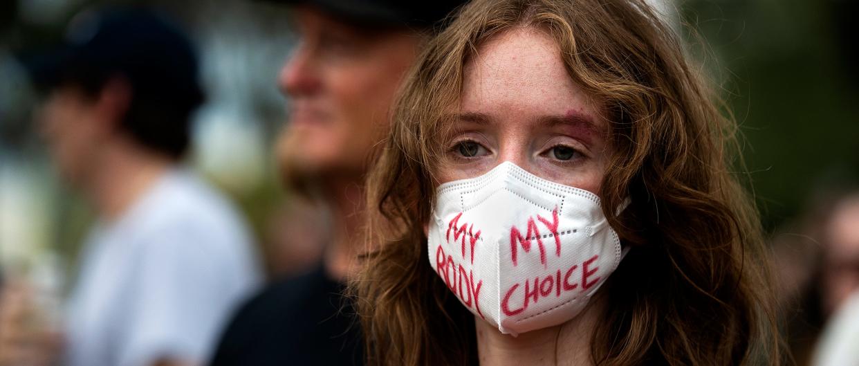 Sarah Barfield wears a mask with the words "My body, my choice" written on it during a rally protesting the reversal of Roe v. Wade in June 2022 outside the Florida Historic Capitol in Tallahassee.