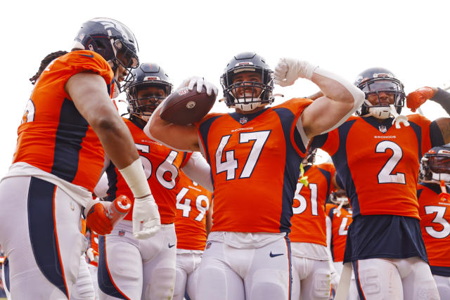 The Broncos' helmet history in photos