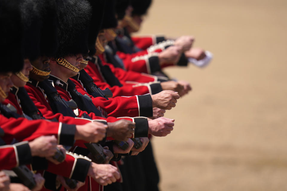 Soldiers parade during the Colonel's Review, the final rehearsal of the Trooping the Colour, the King's annual birthday parade, at Horse Guards Parade in London, Saturday, June 10, 2023. (AP Photo/Alberto Pezzali)