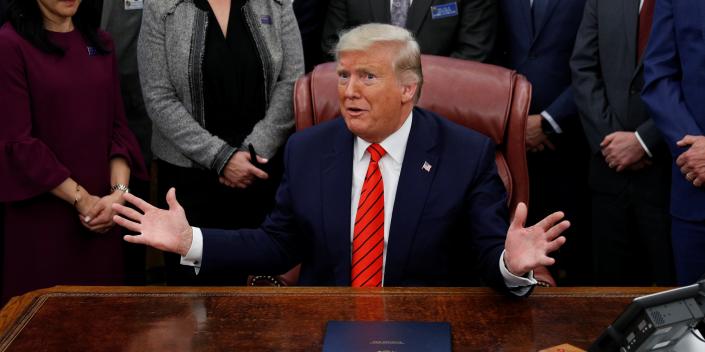 U.S. President Donald Trump reacts to a question from a reporter following a signing ceremony for the Supporting Veterans in STEM Careers Act inside the Oval Office of the White House in Washington, U.S., February 11, 2020.  REUTERS/Tom Brenner
