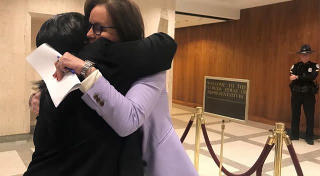 After she watched the House vote to send the legislation to the governor, advocate Sherry Johnson fiercely hugged bill sponsor Sen. Lizbeth Benacquisto, R-Fort Myers, outside the chamber doors. Source: Getty Images