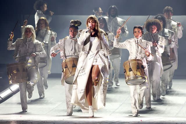 <p>Kevin Mazur/TAS24/Getty</p> Taylor Swift performs on stage for her Eras Tour at La Defense in Paris