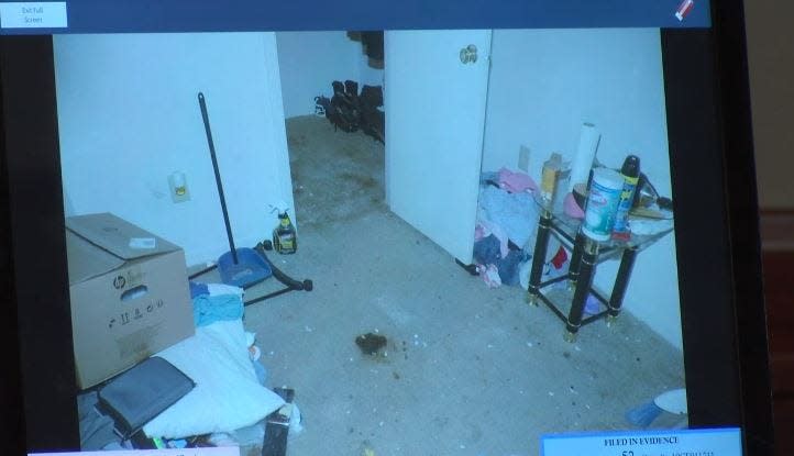 A 2019 Jacksonville Sheriff's Office evidence photo shown in court shows feces stains on carpet inside and outside a bedroom closet in Brianna Williams' home in the Paradise Island complex.