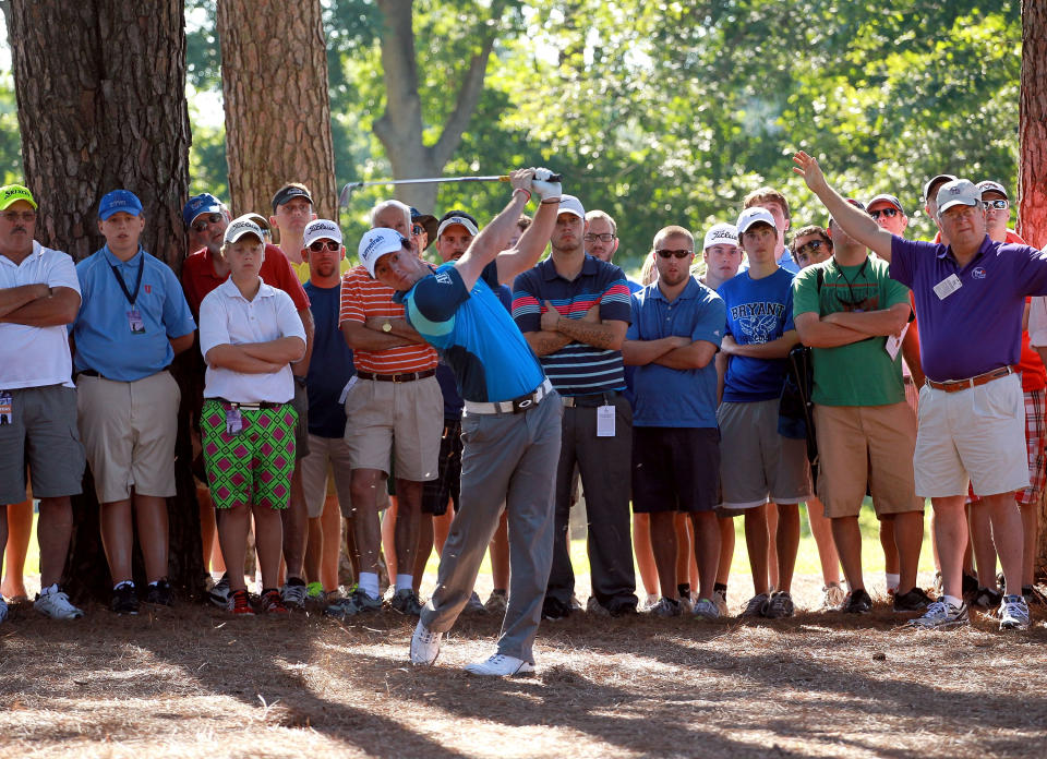 Rory McIlroy of Northern Ireland hits his second shot on the par 5 16th hole during the first round of the FedEx St. Jude Classic at TPC Southwind on June 7, 2012 in Memphis, Tennessee. (Photo by Andy Lyons/Getty Images)