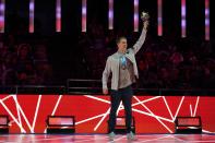 Chase Kalisz waves at the award ceremony after winning the Men's 400 Individual Medley at the U.S. Olympic Swim Trials on Sunday, June 13, 2021, in Omaha, Neb. (AP Photo/Charlie Neibergall)