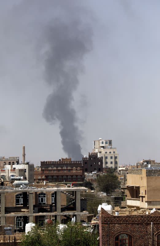 Smoke billows from the site of a Saudi-led air strike in Sanaa