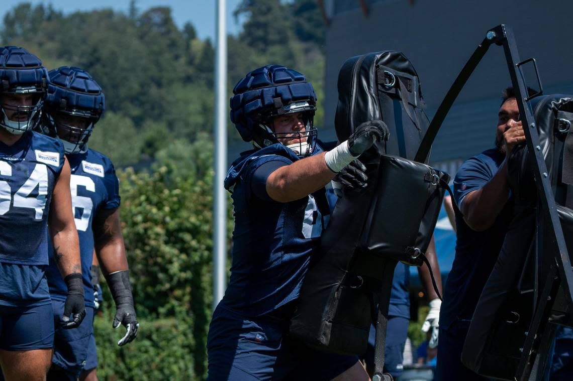 Seattle Seahawks center Austin Blythe works on his defensive drills tackling dummies during the second day of Seahawks training camp at the Virginia Mason Athletic Center on July 28, 2022.