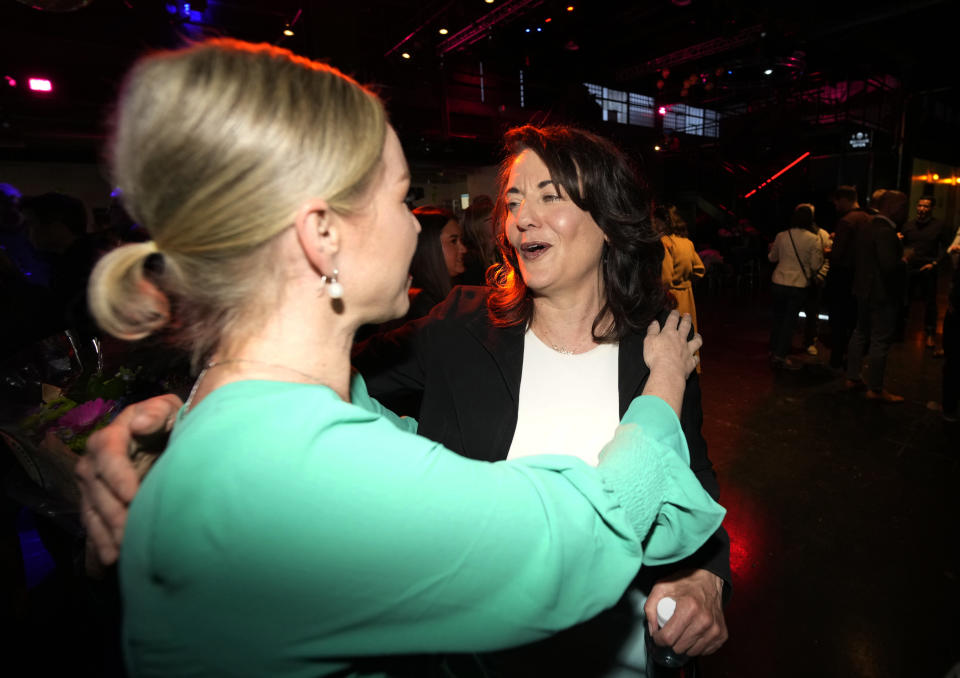 Denver mayoral candidate Kelly Brough is congratulated by well-wishers during an election eve watch party late Tuesday, April 4, 2023, in north Denver. Brough and Mike Johnston were the leading vote-getters in the race, which fielded 16 candidates. (AP Photo/David Zalubowski)