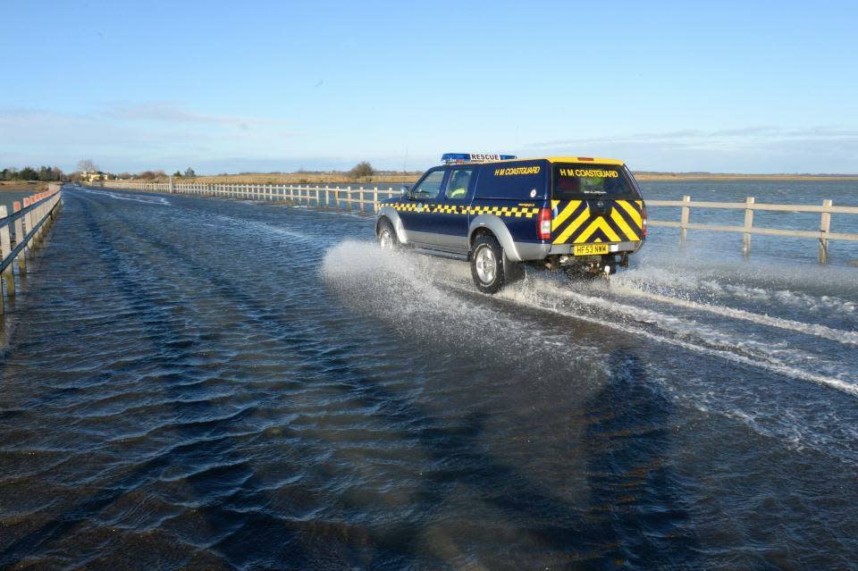 The couple were stranded in rising tide (Picture: West Mersea Coastguard/Facebook)