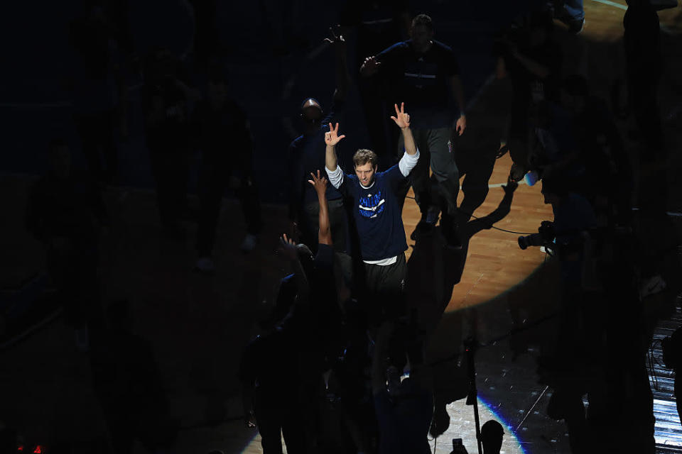 Dirk Nowitzki will stay in the spotlight in Dallas. (Ronald Martinez/Getty Images)