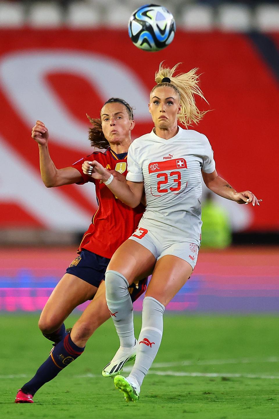 CORDOBA, SPAIN - SEPTEMBER 26: Irene Paredes of Spain jumps for the ball with Alisha Lehmann of Switzerland during the UEFA Women's Nations League Group D match between Spain and Switzerland at Estadio Nuevo Arcangel on September 26, 2023 in Cordoba, Spain. (Photo by Fran Santiago/Getty Images)