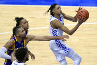 Kentucky's B.J. Boston, right, shoots in front of Morehead State players during the second half of an NCAA college basketball game in Lexington, Ky., Wednesday, Nov. 25, 2020. Kentucky won 81-45. (AP Photo/James Crisp)