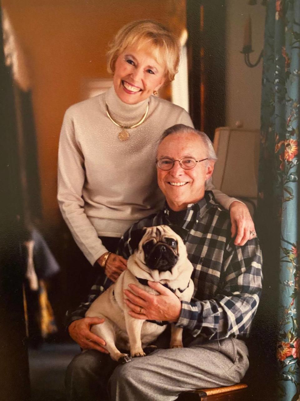 Margaret and Ed Powe, photographed about 10 years ago with their dog Moses.