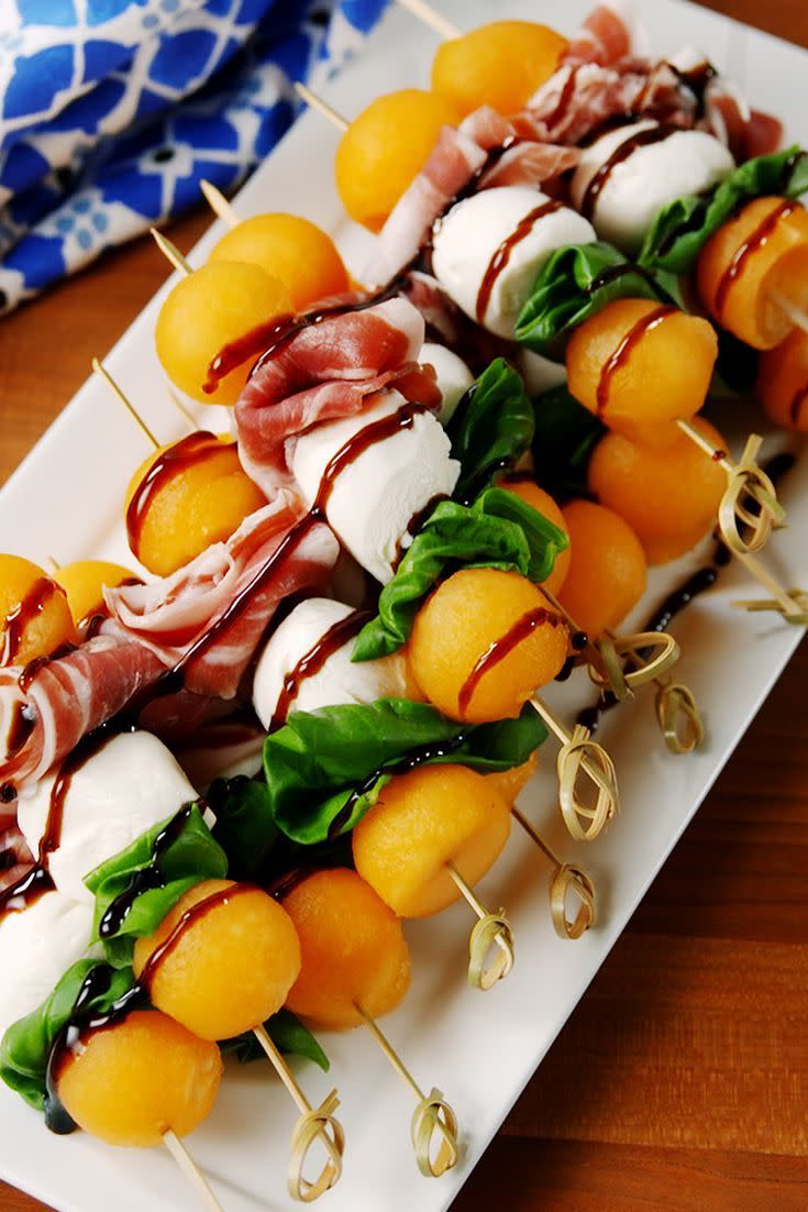 <p>These *classy* skewers are the easy summer app you've been searching for.</p><p>Get the <a href="https://www.delish.com/uk/cooking/recipes/a31220113/melon-prosciutto-skewers-recipe/" rel="nofollow noopener" target="_blank" data-ylk="slk:Melon Prosciutto Skewers;elm:context_link;itc:0;sec:content-canvas" class="link ">Melon Prosciutto Skewers</a> recipe.</p>