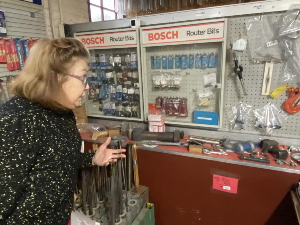 This is the part of Capital Screw and Nut Co. that customers see. The company’s operator, Marianne Clay, points to a sampling of the varied type of fasteners that Capital has seen over the years.