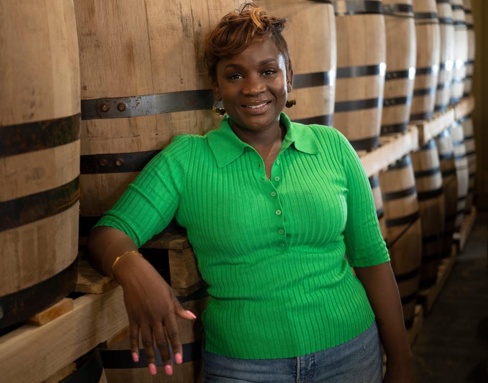 Eboni Major at the Corsair Distillery in Ashland City, Tenn. Major says her long-term goal is to open a whiskey center highlighting small, innovative distilleries. "Where I'm just like an old lady with her cats, but an old girl with her barrels," she said.