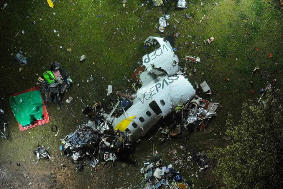 The debris of the plane is seen at the site of the crash in Vinhedo (AP)