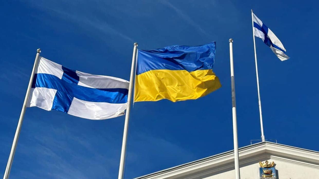 Finnish and Ukrainian flags.
