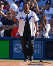 <p>Denzel Washington hits the field for a Jackie Robinson tribute ahead of the MLB All-Star Game at Dodger Stadium in L.A. on July 19.</p>