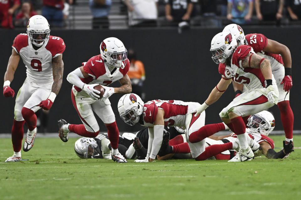 Arizona Cardinals cornerback Byron Murphy Jr. (7) picks up a fumble and returns it for the game-winning touchdown during overtime of an NFL football game against the Las Vegas Raiders Sunday, Sept. 18, 2022, in Las Vegas. Arizona won 29-23. (AP Photo/David Becker)