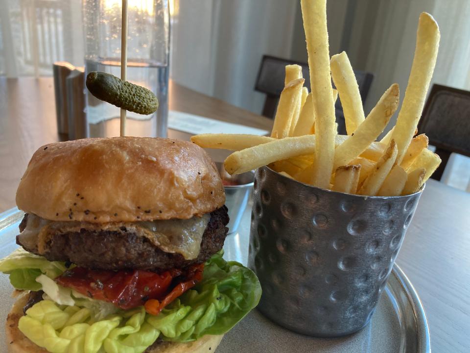The Spruce burger, which features Vermont-raised wagyu beef and Vermont cheddar, shown Jan. 20, 2022 at Alpine Hall at The Lodge at Spruce Peak in Stowe.