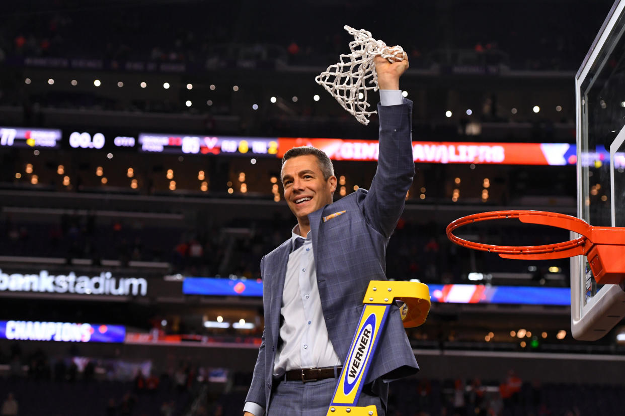 MINNEAPOLIS, MINNESOTA - APRIL 08: Head coach Tony Bennett of the Virginia Cavaliers raises the net after defeating the Texas Tech Red Raiders in the 2019 NCAA men's Final Four National Championship game at U.S. Bank Stadium on April 08, 2019 in Minneapolis, Minnesota. (Photo by Jamie Schwaberow/NCAA Photos via Getty Images)