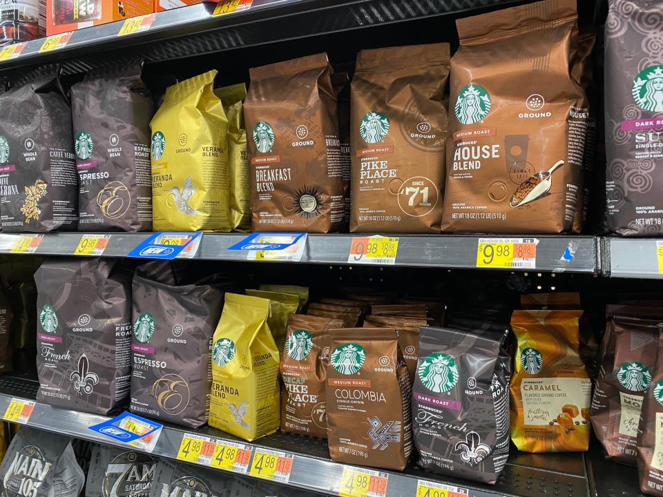 shelving filled with cheap starbucks coffee at a walmart