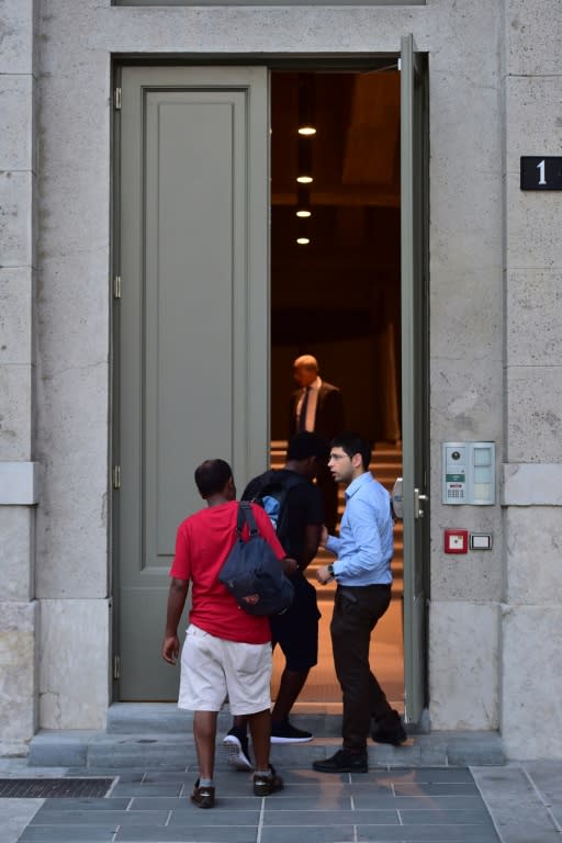 Migrants arrive at Milan's Binario 21 ('Platform 21') holocaust museum seeking refuge after the centre's cloakroom was transformed into a shelter