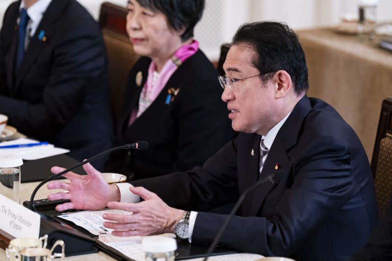 Fumio Kishida, Japan's prime minister, speaks during a trilateral meeting with President Joe Biden Philippines President Ferdinand Marcos Jr. in the East Room of the White House. Photo by Al Drago/UPI