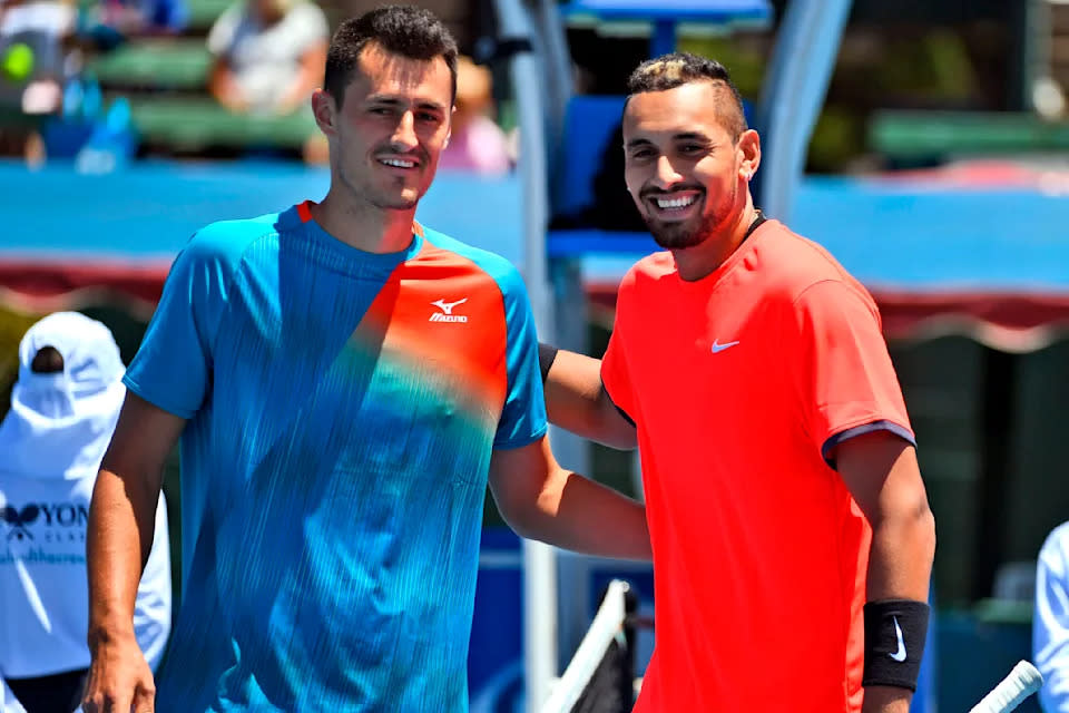 Bernard Tomic and Nick Kyrgios at Kooyong in 2019. (Photo by WILLIAM WEST/AFP via Getty Images)
