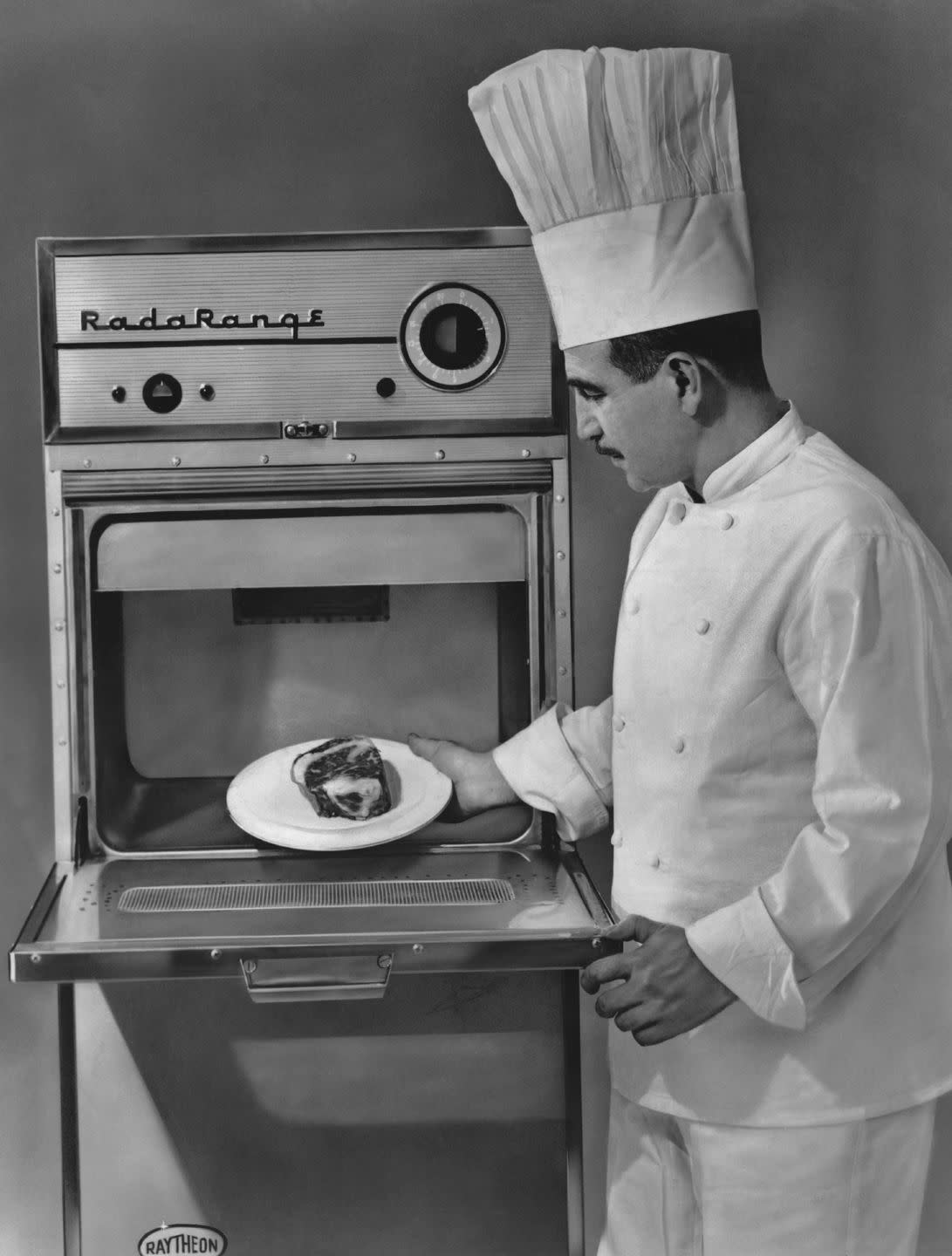 when was the microwave invented, cook, major appliance, chef, cooking, home appliance, chef's uniform, kitchen appliance, gas, service, machine,