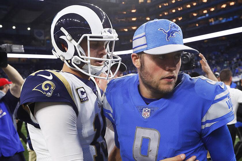 The Rams' Jared Goff and the Detroit Lions' Matthew Stafford after a game in 2018.