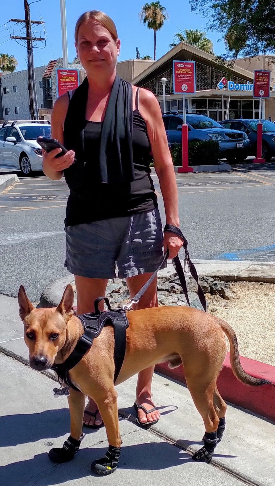 Crystal Vandenberg and her dog, Pepito, in Palm Springs, Calif., on July 10, 2022.