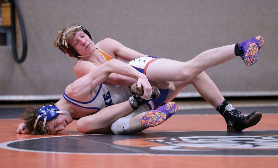 Hoover's Alex Boske, top, competes against Lake's Josh Jordan in their 150 pound match at Hoover , Thursday, Feb. 9, 2023.