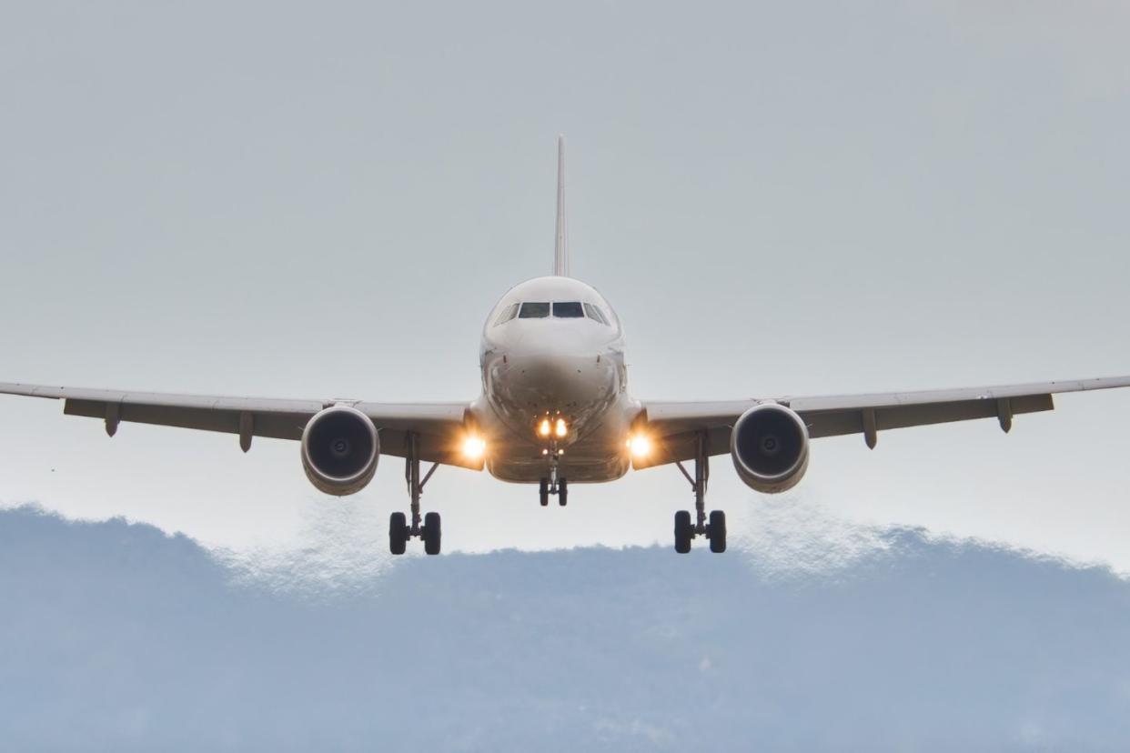 Low angle view of airplane during landing