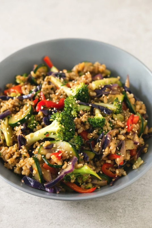 <p>Simple Vegan Blog</p><p>This brown rice stir-fry with vegetables is life-changing and so simple. Add your favorite veggies or what’s in season.</p><p><strong>Get the recipe: <a href="https://simpleveganblog.com/brown-rice-stir-fry-with-vegetables/" rel="nofollow noopener" target="_blank" data-ylk="slk:Simple Brown Rice with Vegetables;elm:context_link;itc:0;sec:content-canvas" class="link ">Simple Brown Rice with Vegetables</a></strong></p>