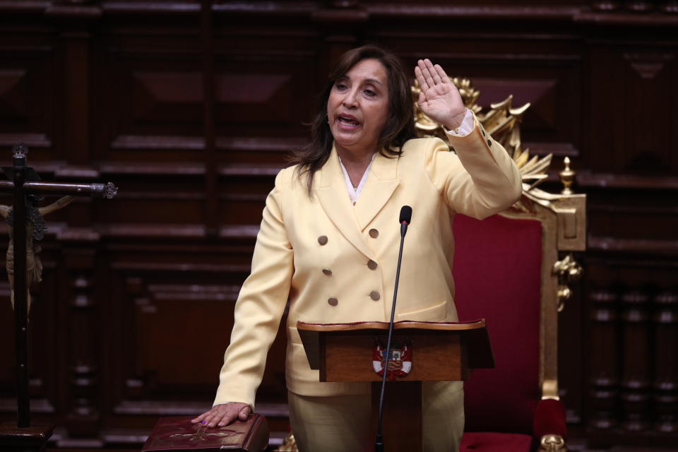 Former Vice President Dina Boluarte takes the oath of office during her swearing-in ceremony to become president at Congress in Lima, Peru, Wednesday, Dec. 7, 2022. Peru's Congress voted to removePresident Pedro Castillofrom office Wednesday and replace him with the vice president, shortly after Castillo tried to dissolve the legislature ahead of a scheduled vote to remove him. (AP Photo/Guadalupe Pardo)