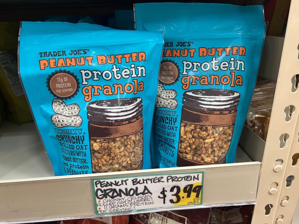 Two bags of peanut-butter protein granola on a shelf at Trader Joe's