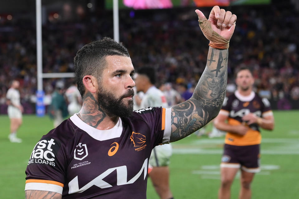 Adam Reynolds applauds the fans.