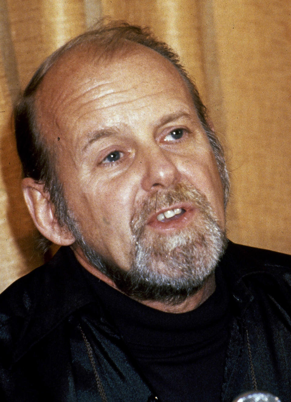 FILE - In this 1980 file photo, director/choreographer Bob Fosse appears during a news conference at the Cannes Film Festival, at Cannes, France. Fosse’s all-singing, all-dancing 1978 revue “Dancin’” is heading back to Broadway. Performances begin March 2, 2023, at the Music Box Theatre, with an opening night set for March 19. (AP Photo/Jean-Jacques Levy, File)
