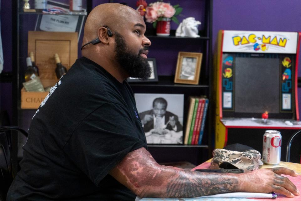 Kahlil "Bubba" Floyd during an interview at one of The Tattooed Pig locations, which he runs with his wife, Angie Floyd, in Aston, Pa., on Monday, Oct. 9, 2023.