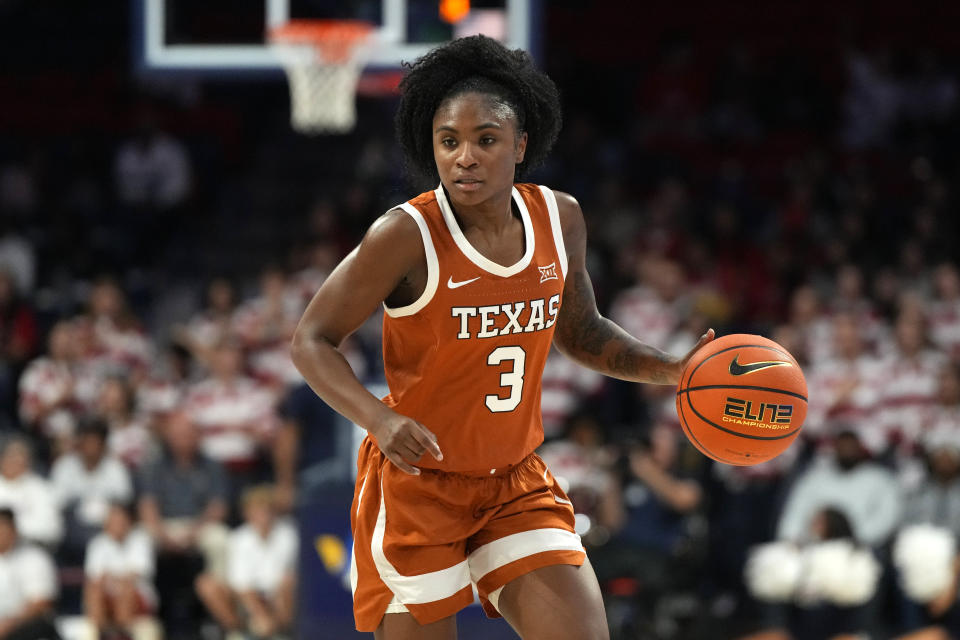 Texas guard Rori Harmon (3) during the first half of an NCAA college basketball game against Arizona, Wednesday, Dec. 13, 2023, in Tucson, Ariz. (AP Photo/Rick Scuteri)