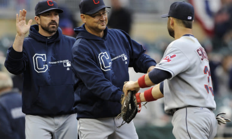 Cleveland Indians manager Terry Francona and pitching coach Mickey Callaway with Nick Swisher.